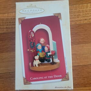 2003 Hallmark Ornament Caroling at the Door